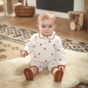 Babies overall with long legs with flowers embroidery.